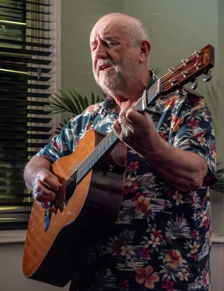 Bob Fox playing guitar